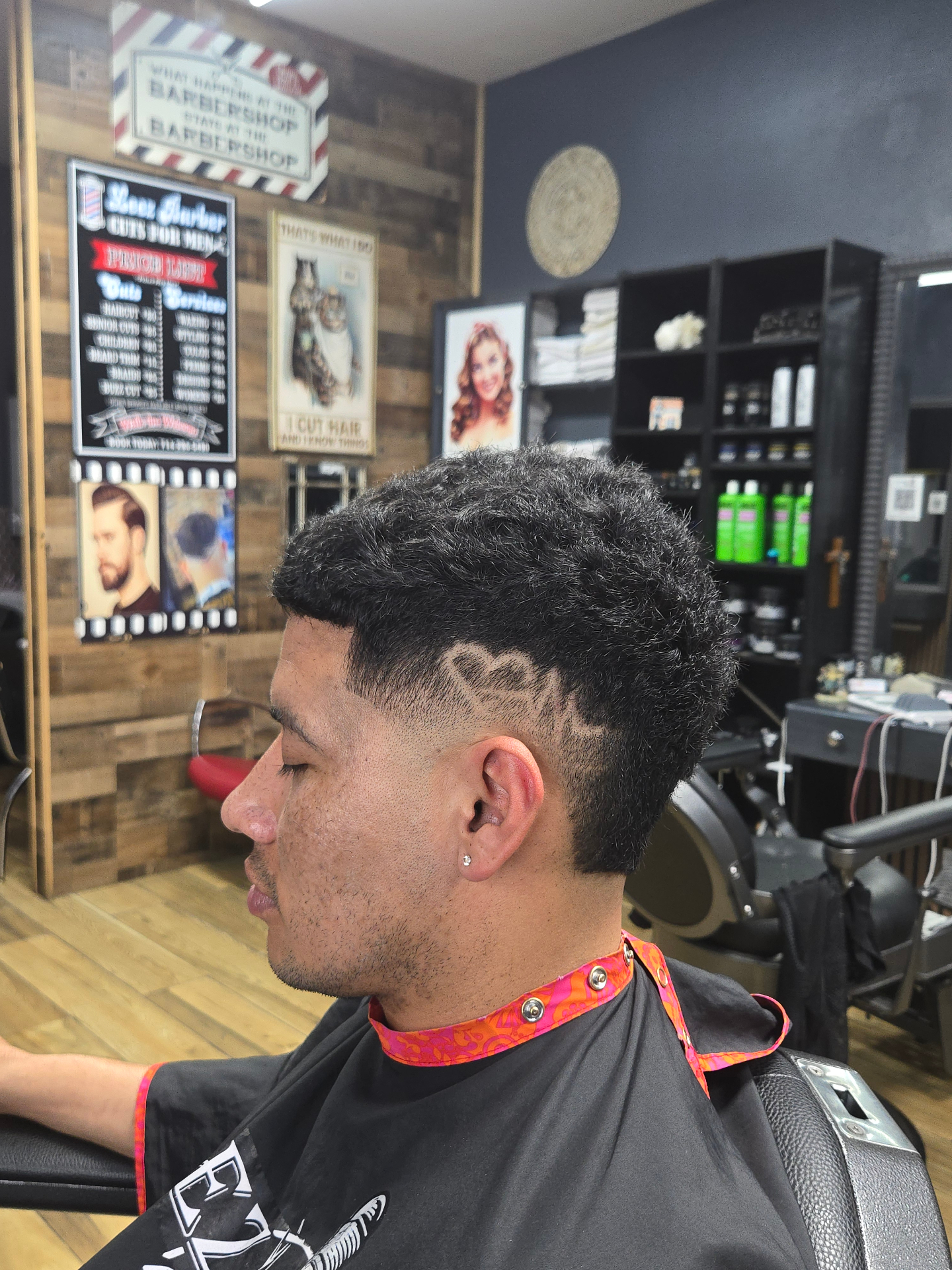 Custom hair design with low fade at Leez Barbershop